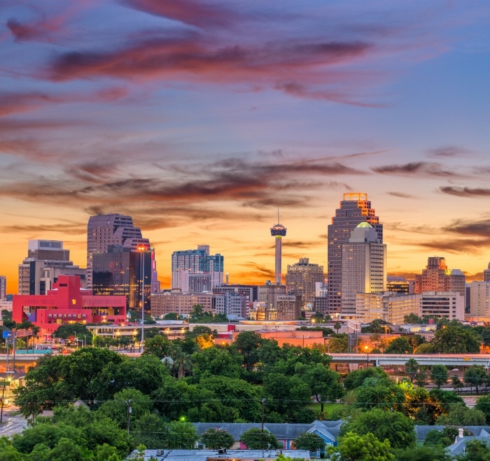 Aerial view of San Antonio city skyline at sunset