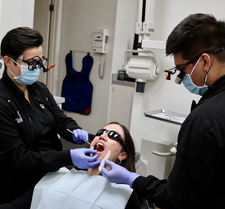 Woman receiving a dental checkup