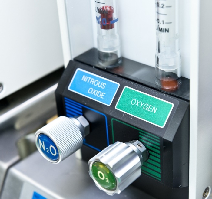 Machine in dental office with buttons labeled nitrous oxide and oxygen